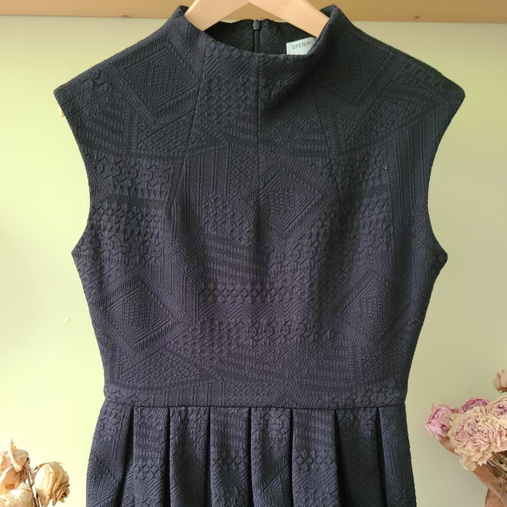 Pleated black structured dress